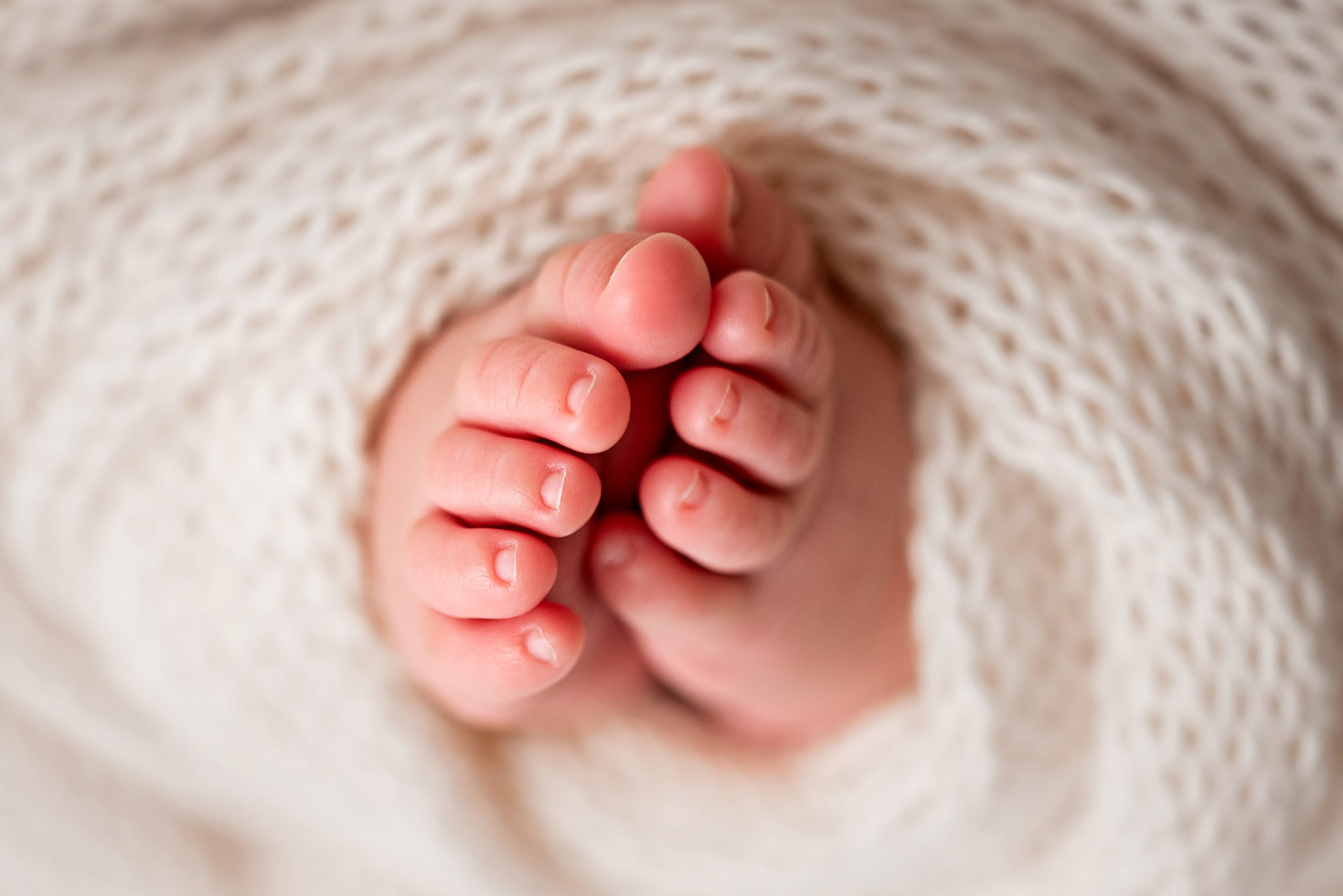 Newborn Photoshoot Wakefield. Close up macro photo of baby's toes.